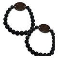 Two matching black lava rock bead friendship bracelets with coconut shell NFC tags